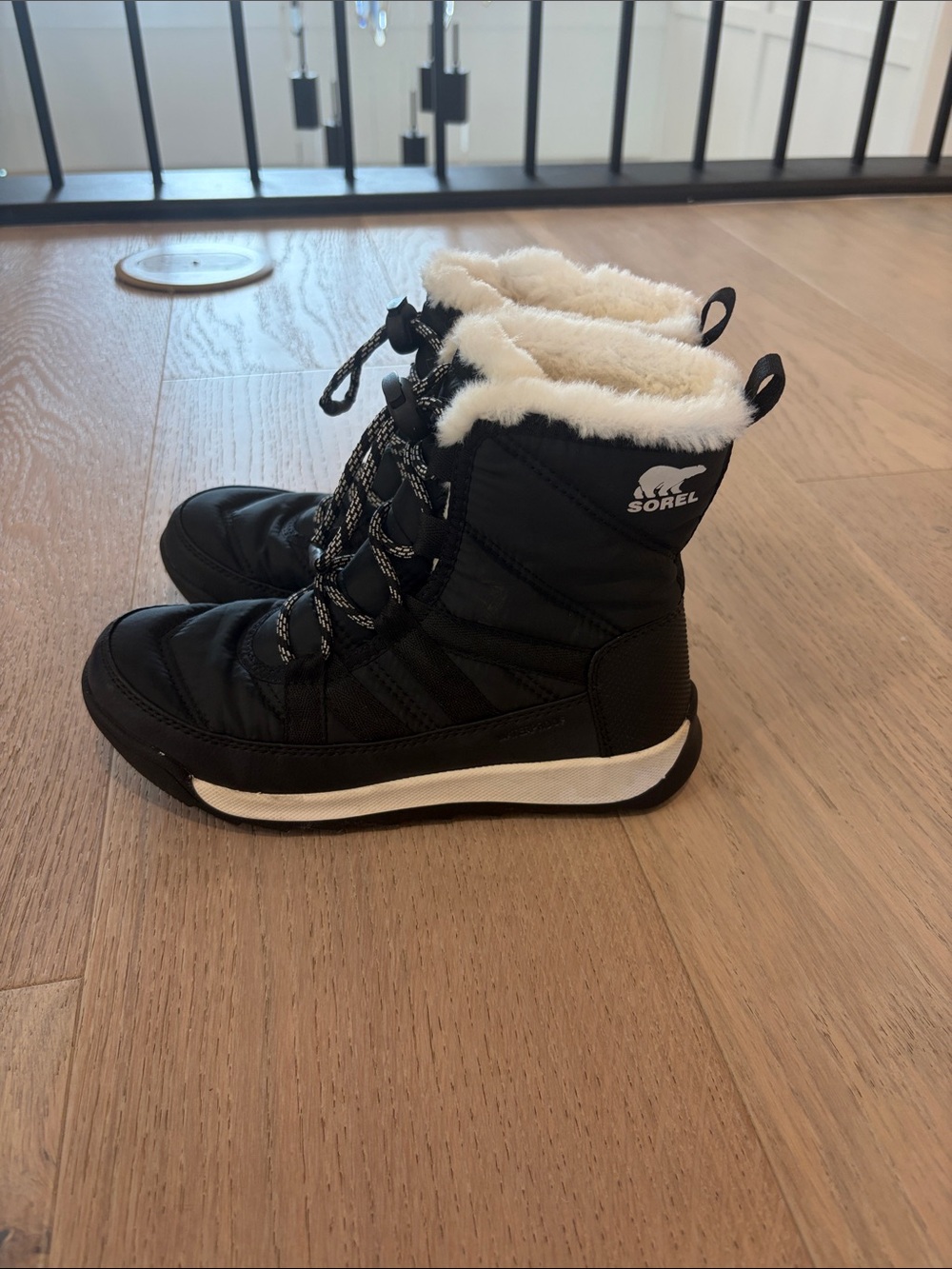 Sorel Kids Black Winter Boot with Cream Faux Fur Trim